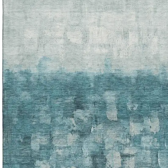 Teal And Ivory Abstract Washable Area Rug With UV Protection Photo 4
