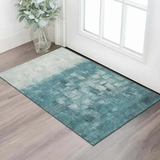 Teal And Ivory Abstract Washable Area Rug With UV Protection Photo 2