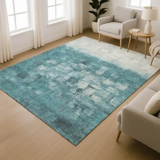 Teal And Ivory Abstract Washable Area Rug With UV Protection Photo 6