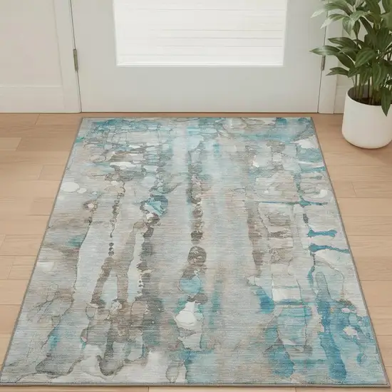 Teal And Ivory Abstract Washable Area Rug With UV Protection Photo 2