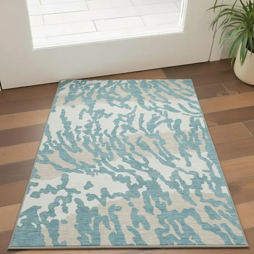 Teal And Ivory Animal Print Washable Area Rug With UV Protection Photo 2