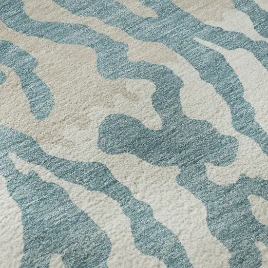 Teal And Ivory Animal Print Washable Area Rug With UV Protection Photo 9
