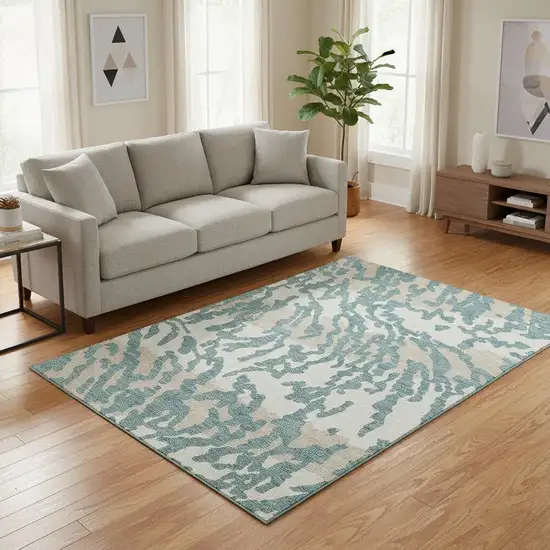 Teal And Ivory Animal Print Washable Area Rug With UV Protection Photo 2