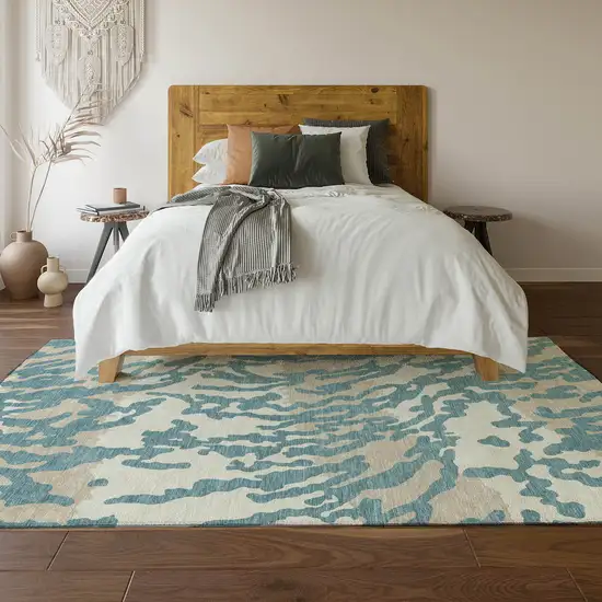 Teal And Ivory Animal Print Washable Area Rug With UV Protection Photo 5