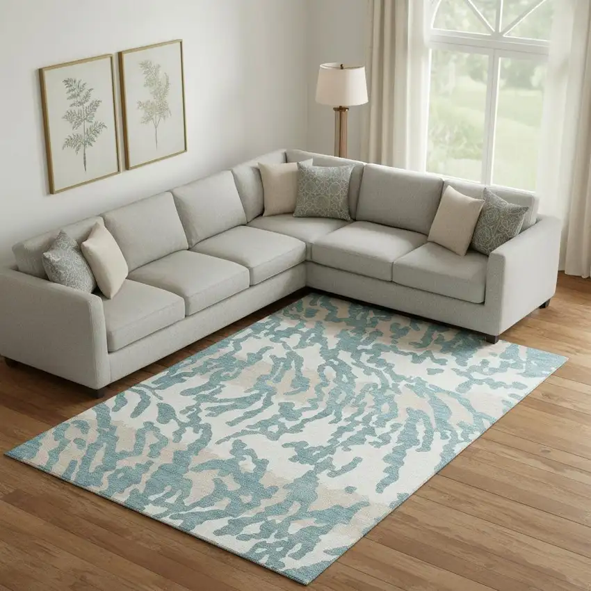 Teal And Ivory Animal Print Washable Area Rug With UV Protection Photo 1