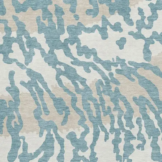 Teal And Ivory Animal Print Washable Area Rug With UV Protection Photo 3