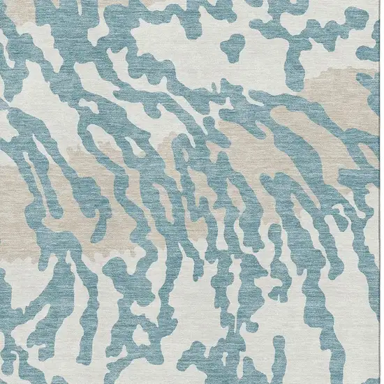 Teal And Ivory Animal Print Washable Area Rug With UV Protection Photo 3