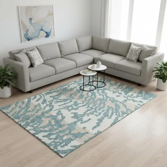 Teal And Ivory Animal Print Washable Area Rug With UV Protection Photo 2