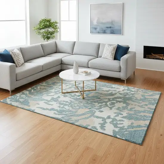 Teal And Ivory Animal Print Washable Area Rug With UV Protection Photo 2