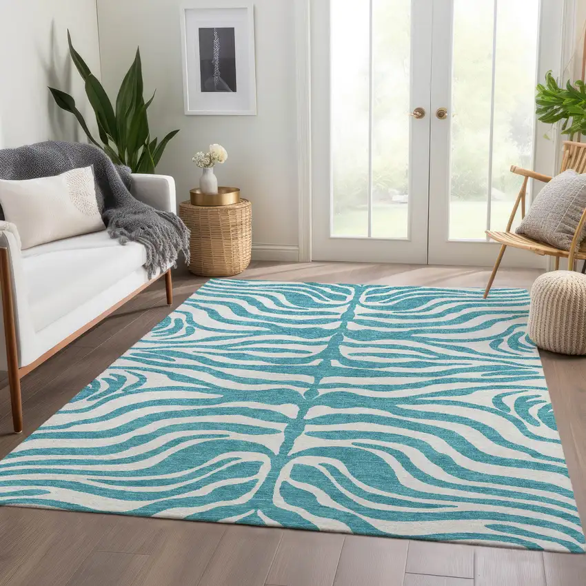 Teal And Ivory Animal Print Washable Area Rug With UV Protection Photo 4