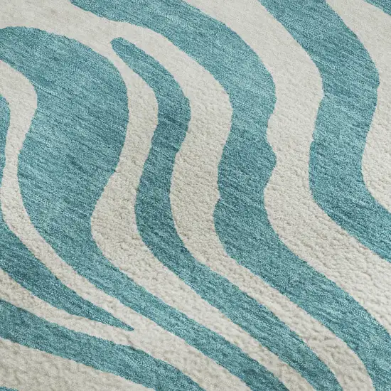 Teal And Ivory Animal Print Washable Area Rug With UV Protection Photo 2