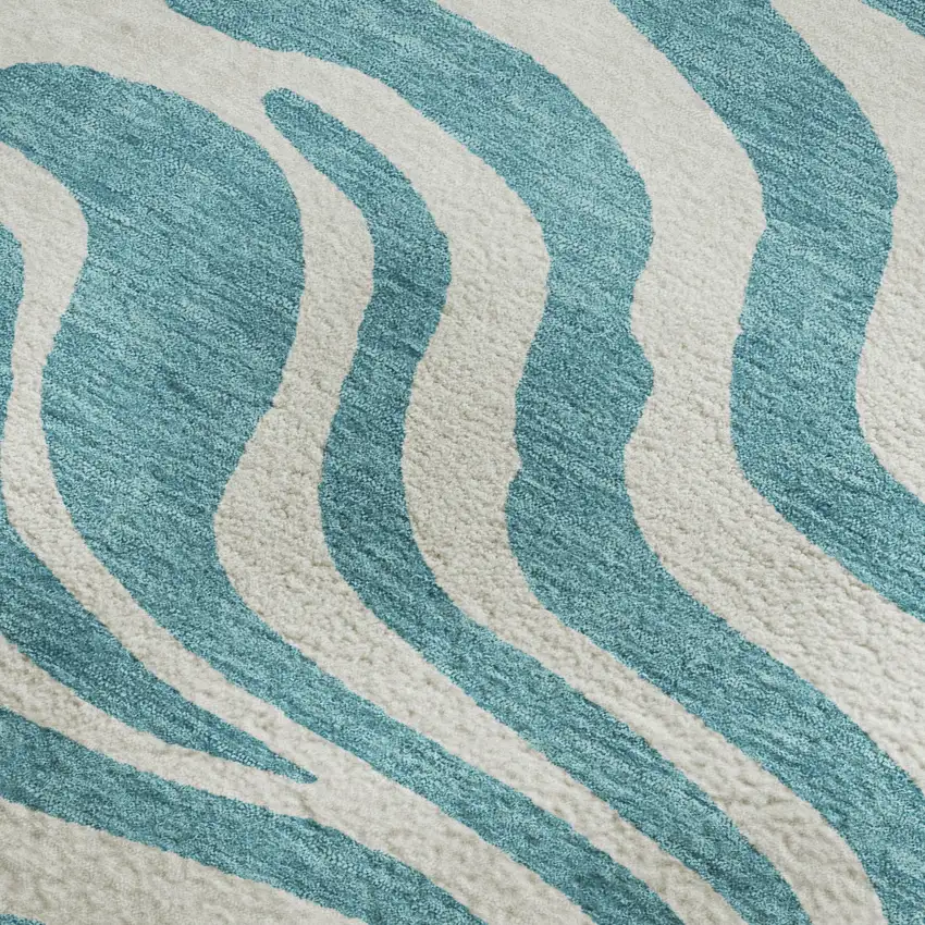 Teal And Ivory Animal Print Washable Area Rug With UV Protection Photo 2