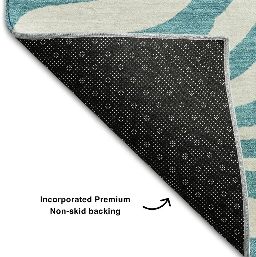 Teal And Ivory Animal Print Washable Area Rug With UV Protection Photo 6