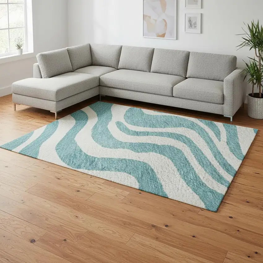 Teal And Ivory Animal Print Washable Area Rug With UV Protection Photo 2