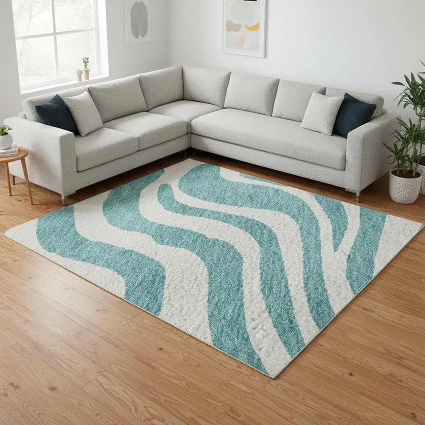 Teal And Ivory Animal Print Washable Area Rug With UV Protection Photo 2