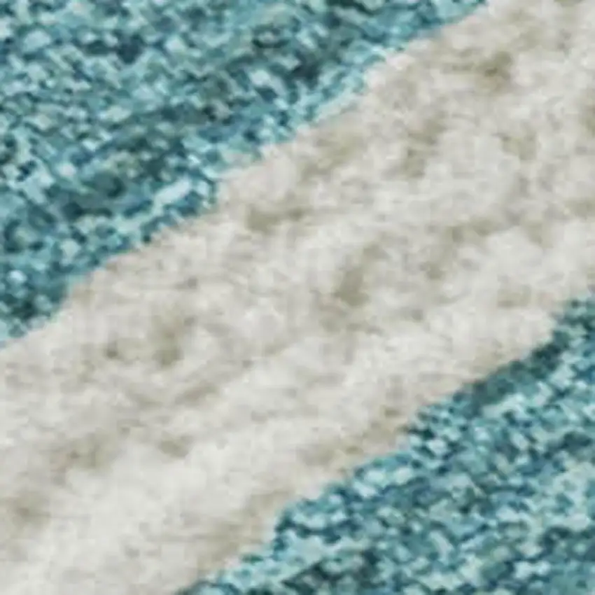 Teal And Ivory Animal Print Washable Area Rug With UV Protection Photo 3