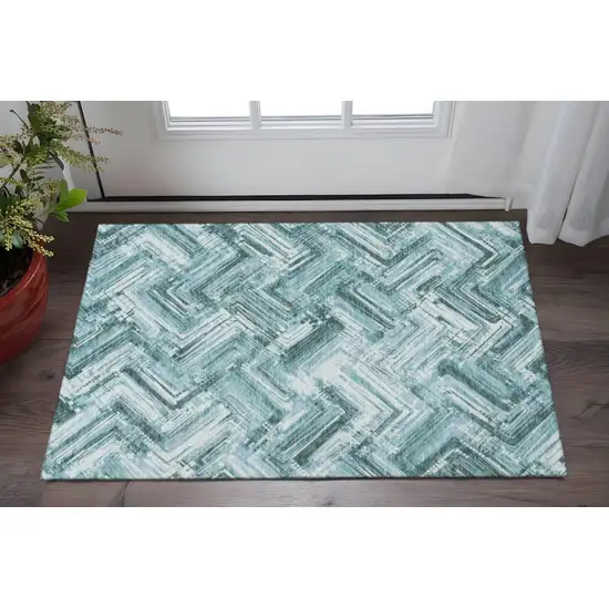 Teal And Ivory Chevron Washable Area Rug With UV Protection Photo 2