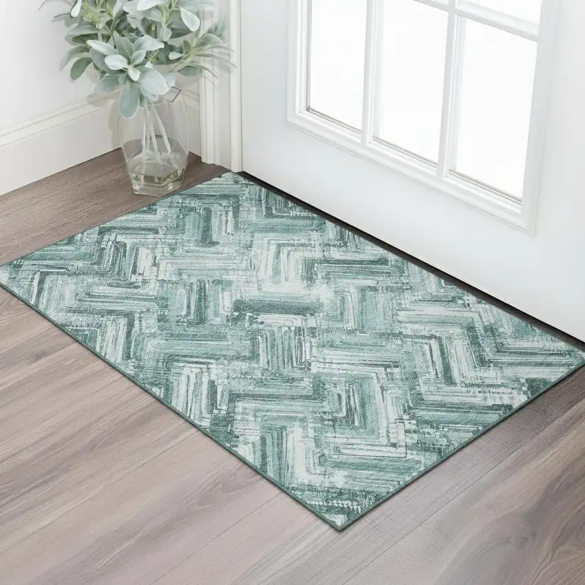 Teal And Ivory Chevron Washable Area Rug With UV Protection Photo 1