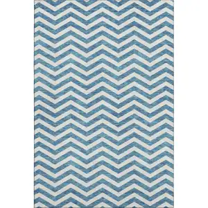 Photo of Teal And Ivory Chevron Washable Area Rug With UV Protection