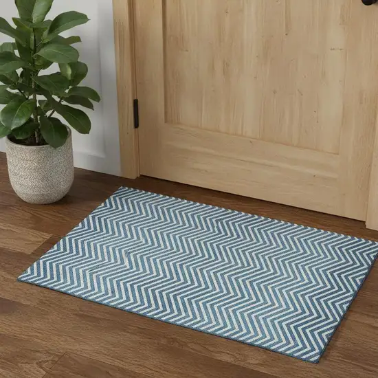 Teal And Ivory Chevron Washable Area Rug With UV Protection Photo 1