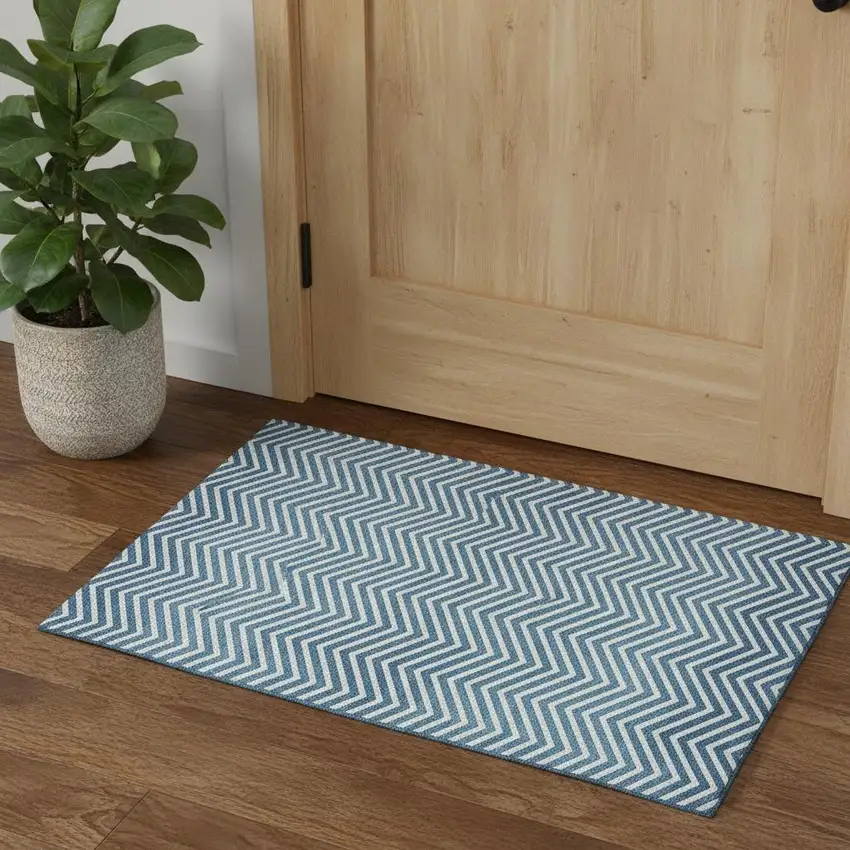 Teal And Ivory Chevron Washable Area Rug With UV Protection Photo 1