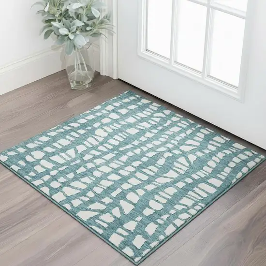 Teal And Ivory Cobblestone Washable Area Rug With UV Protection Photo 2