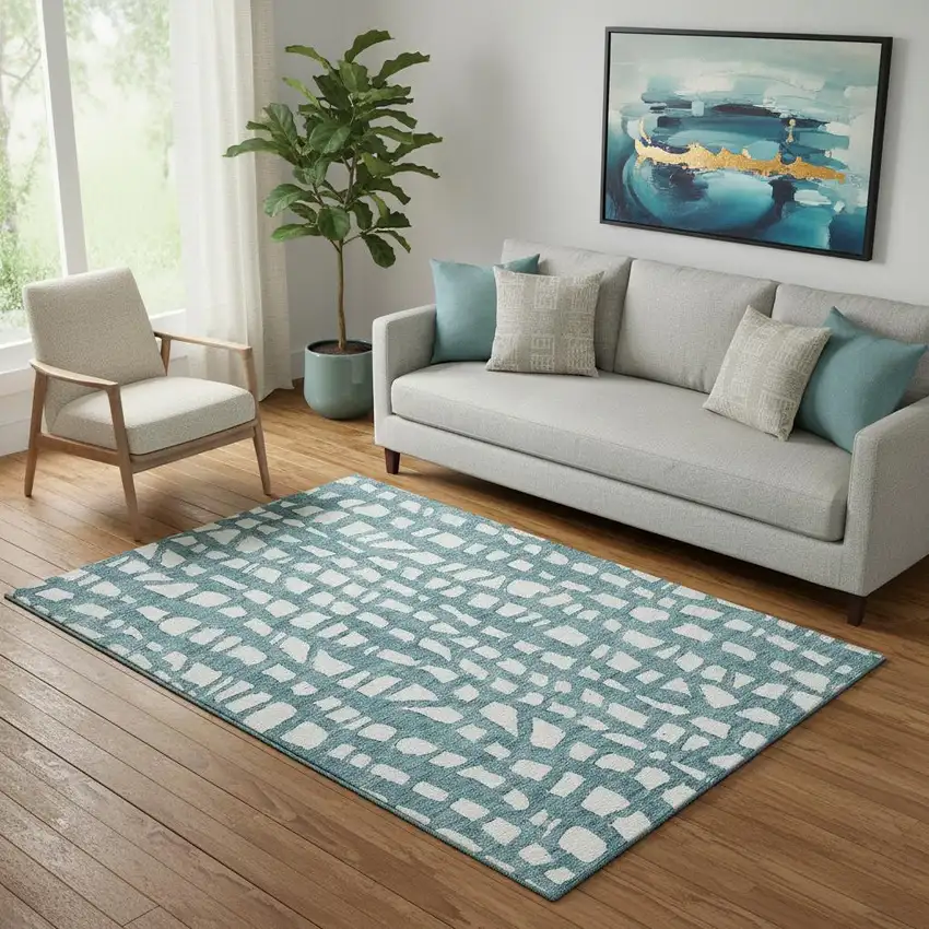 Teal And Ivory Cobblestone Washable Area Rug With UV Protection Photo 1