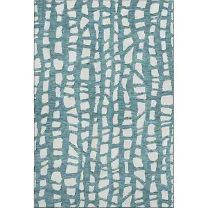Photo of Teal And Ivory Cobblestone Washable Area Rug With UV Protection