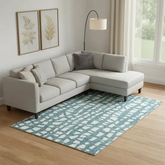 Teal And Ivory Cobblestone Washable Area Rug With UV Protection Photo 1