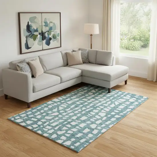 Teal And Ivory Cobblestone Washable Area Rug With UV Protection Photo 3