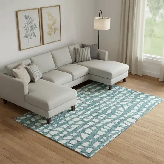 Teal And Ivory Cobblestone Washable Area Rug With UV Protection Photo 1