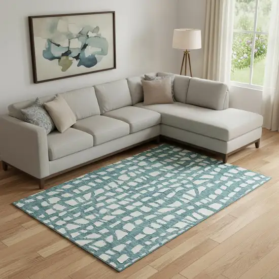 Teal And Ivory Cobblestone Washable Area Rug With UV Protection Photo 1