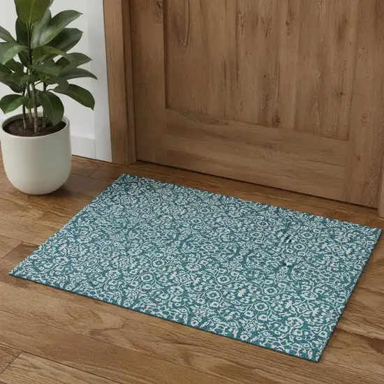 Teal And Ivory Damask Washable Area Rug With UV Protection Photo 1