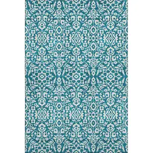 Photo of Teal And Ivory Damask Washable Area Rug With UV Protection