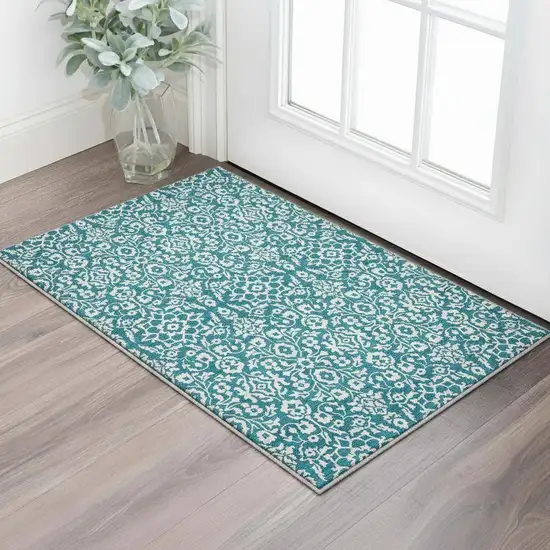 Teal And Ivory Damask Washable Area Rug With UV Protection Photo 2