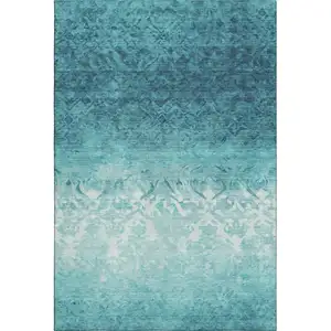 Photo of Teal And Ivory Damask Washable Area Rug With UV Protection