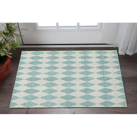 Teal And Ivory Diamond Washable Area Rug With UV Protection Photo 2
