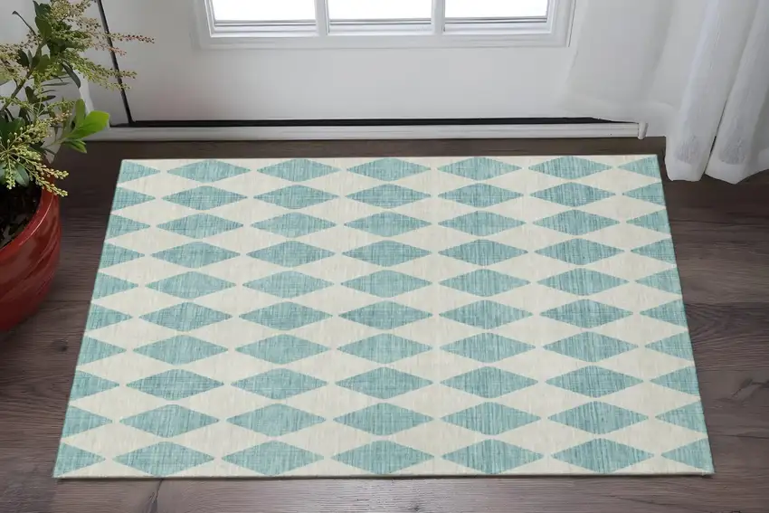 Teal And Ivory Diamond Washable Area Rug With UV Protection Photo 2