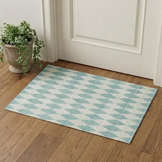 Teal And Ivory Diamond Washable Area Rug With UV Protection Photo 1