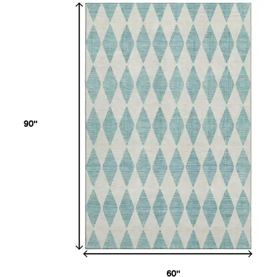 Teal And Ivory Diamond Washable Area Rug With UV Protection Photo 6