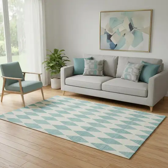 Teal And Ivory Diamond Washable Area Rug With UV Protection Photo 1