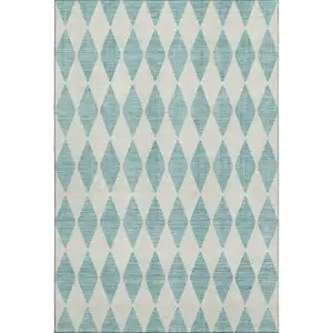 Photo of Teal And Ivory Diamond Washable Area Rug With UV Protection