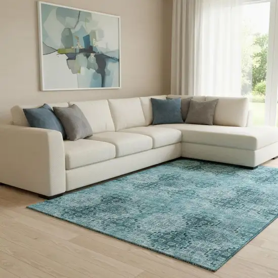Teal And Ivory Floral Medallion Washable Area Rug With UV Protection Photo 1