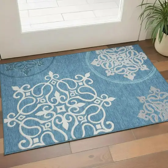 Teal And Ivory Floral Medallion Washable Area Rug With UV Protection Photo 1