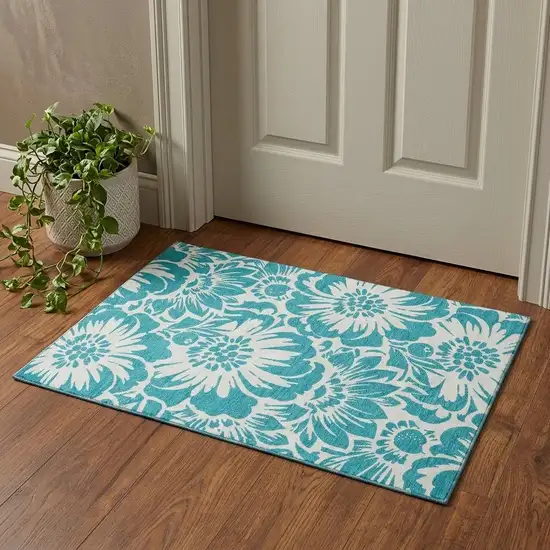 Teal And Ivory Floral Washable Area Rug With UV Protection Photo 1