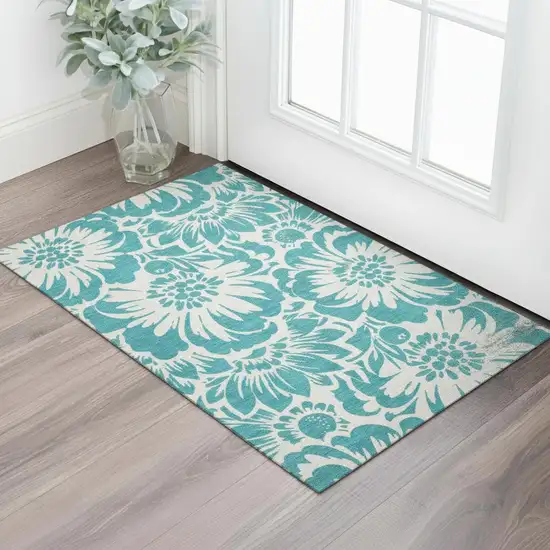 Teal And Ivory Floral Washable Area Rug With UV Protection Photo 1