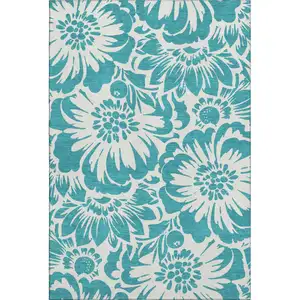 Photo of Teal And Ivory Floral Washable Area Rug With UV Protection