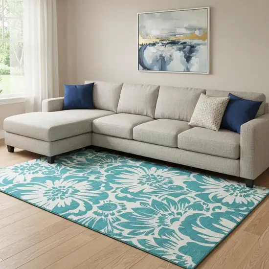 Teal And Ivory Floral Washable Area Rug With UV Protection Photo 1