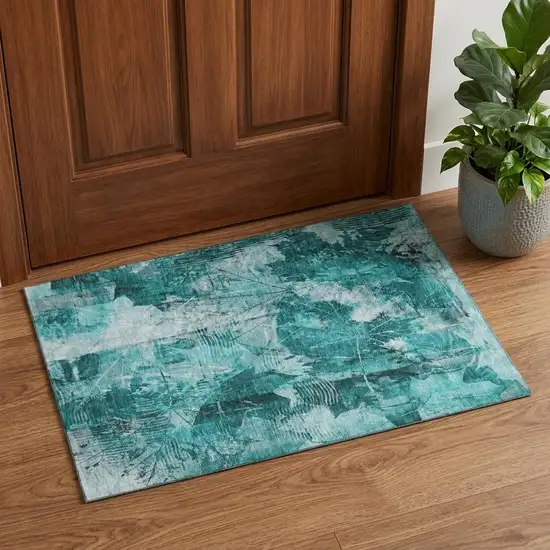 Teal And Ivory Floral Washable Area Rug With UV Protection Photo 1