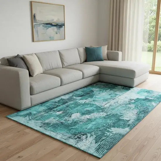 Teal And Ivory Floral Washable Area Rug With UV Protection Photo 1